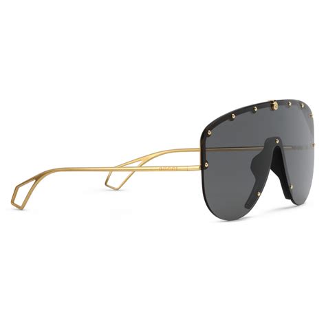 masque gucci|Mask sunglasses in gold.